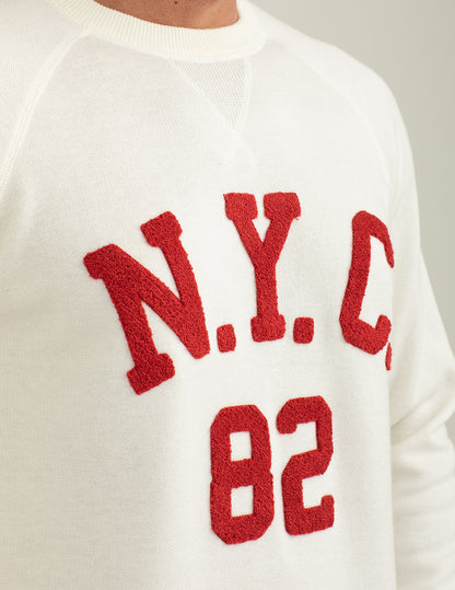 Crew-neck sweater with raglan cut