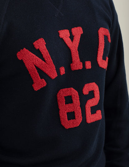 Crew-neck sweater with raglan cut