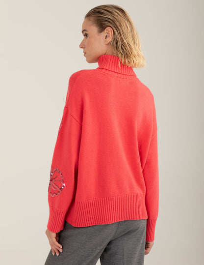 Maglia dolcevita con ricami floreali