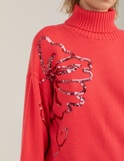 Maglia dolcevita con ricami floreali