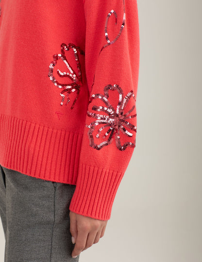 Maglia dolcevita con ricami floreali