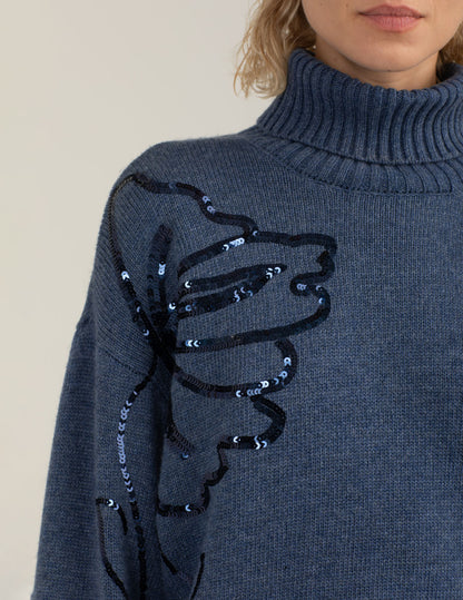 Maglia dolcevita con ricami floreali