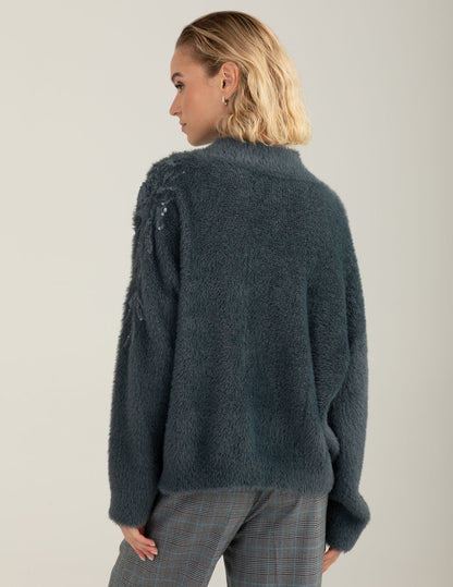 Dolcevita effetto pelliccia con ricami e paillettes