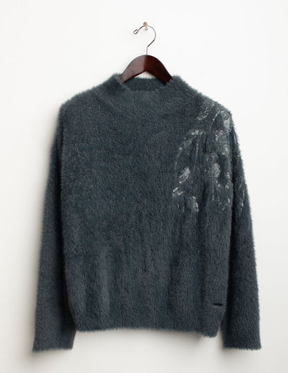 Dolcevita effetto pelliccia con ricami e paillettes