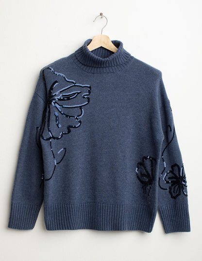 Maglia dolcevita con ricami floreali