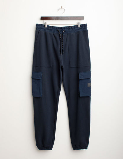Pantalone tasconato in felpa con dettagli nylon