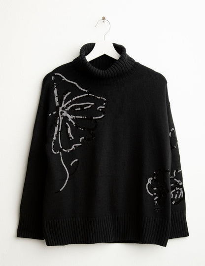 Maglia dolcevita con ricami floreali